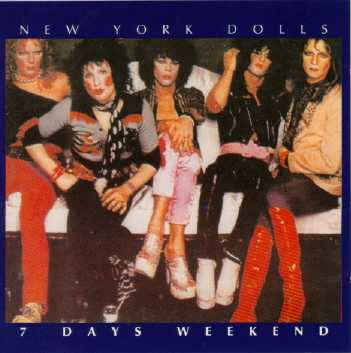 Cover of the CD and LP. Dolls on a couch. Similar to first album cover only in color.